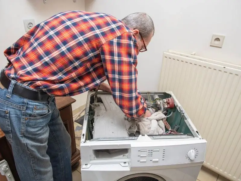Washing machine repair near me – expert technician fixing washer